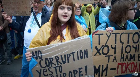 woman holding sign in protest